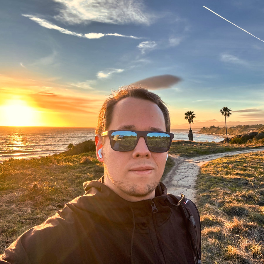 Portrait of Krzysztof Kotysz on the California coast at sunset