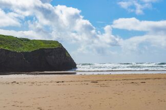 Cliff, beach and ocean